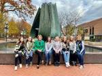 Girl Scouts with Senator Shelley Moore Capito in front of the Memorial Fountain by Marshall University and Girl Scouts of Black Diamond Council