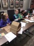 Girl Scouts working on a badge by Marshall University and Girl Scouts of Black Diamond Council