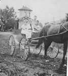 Catherine Enslow (2nd from left) in horse cart, ca. early 1910's