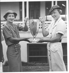Fritzi Stifel receiving WV State Womens Golf Championship trophy