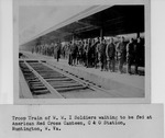 Troop Train of W.W. I Soldiers waiting to be fed at American Red Cross Canteen, C&O Station