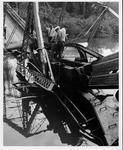 Clearing wreckage at the David Brinkley bridge, Wayne, WV, Sept. 1970,