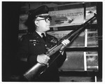 Lt. Col. James B. Bryant of Ft. Campbell, KY holding M-14 rifle