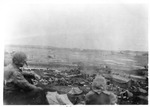 WWII Pacific Theater, combat photo: US airplane landing site and supply camp