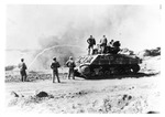 WWII Pacific Theater, combat photo: US Marines with flame-throwing tank by Earl F. Dickinson