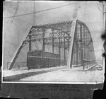 Camden Interstate RR car on bridge over Guyan River to Guyandotte, 1908