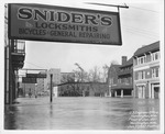 11th St. between 4 & 5th Ave, facing north, 1937 Flood, Huntington, W.Va.