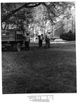 Building & Grounds personnel working in front of Morrow Library