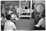 Dr. T. W. Olson's Enginering Class, using stress testing machine, 1968