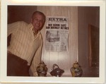 Chuck Yeager with Newspaper Titled "Red Baron Safe! Don Bochkay Retires"