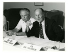 Brigadier General Chuck Yeager in a Meeting Sitting Next to Colonel Gail Halverson